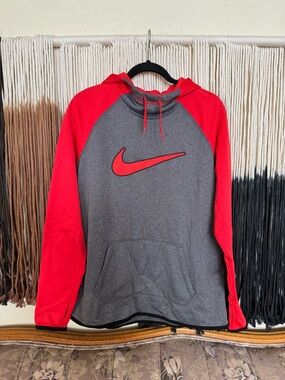 Red and grey Nike hoodie with thumb holes; perfect condition!